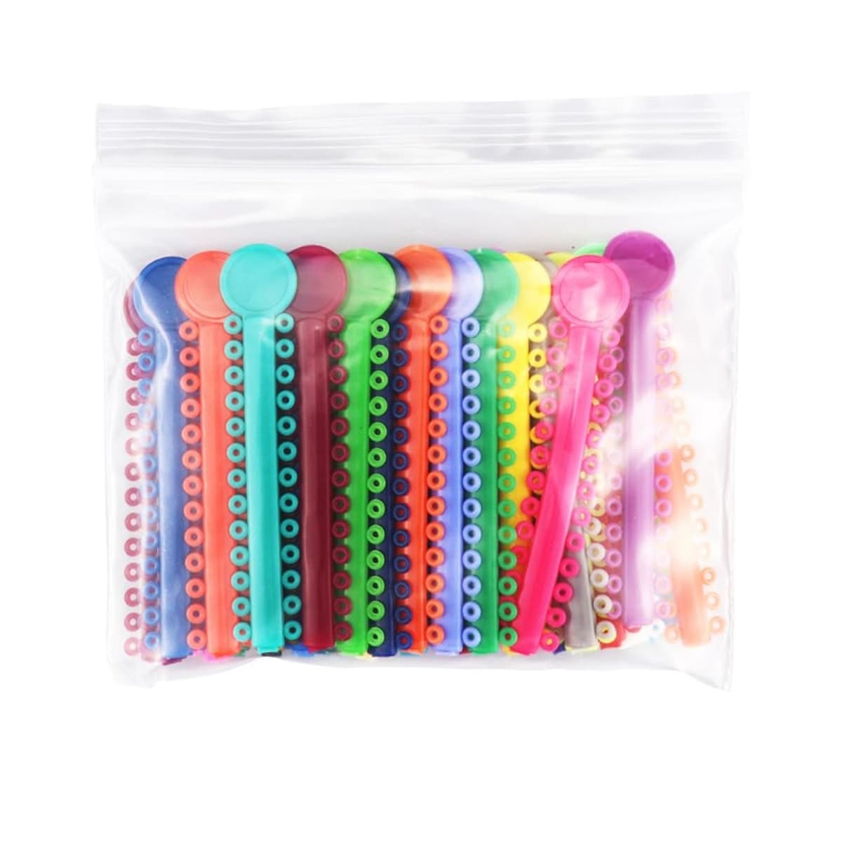 Orthodontic elastomeric products in neutral clear packaging